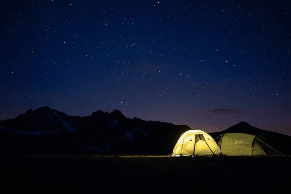 Lit up tents in the night