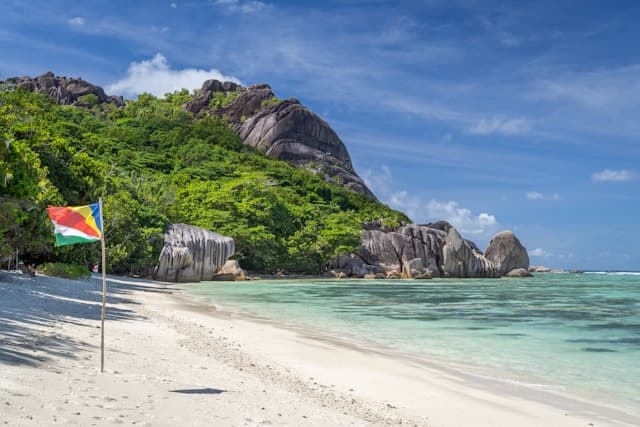 Seychelles flag on the beach