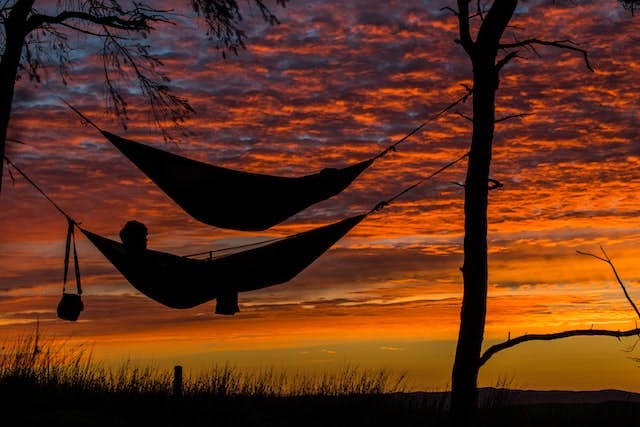 Person relaxing in hammock
